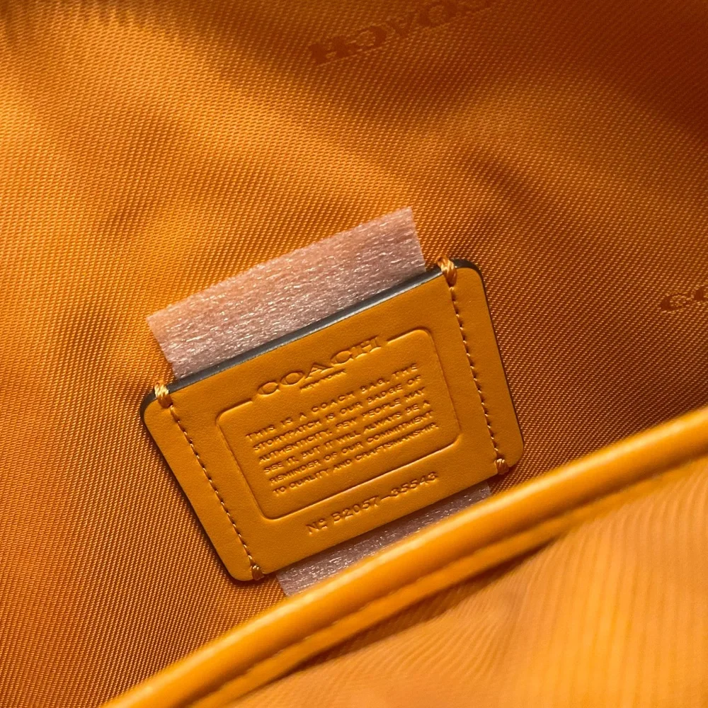 Coach Mustard Pebbled Leather Crossbody Bag